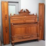 A 19th century French oak double bed, with double panel head and foot board,