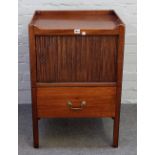 A George III mahogany tray top night stand, with tambour panel over pull out on block supports,