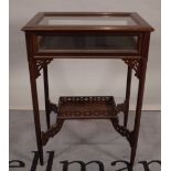 A late Victorian mahogany bijouterie table on tapering supports, 56cm wide x 78cm high.