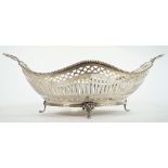 A Dutch twin handled fruit or cake basket, of shaped oval form,