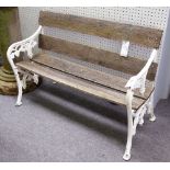 Falkirk Foundry; a pair of white painted cast iron garden benches,