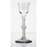 An opaque twist wine glass, circa 1765,