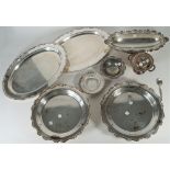 A group of plated wares, comprising; two shaped oval serving dishes, decorated with gadrooned rims,