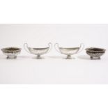 A pair of George IV silver salts, each of compressed circular form, with fluted decoration,