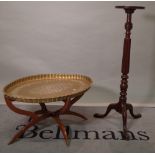 A Regency mahogany jardiniere stand on reeded column and downswept supports,