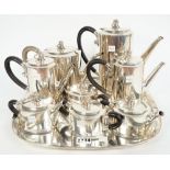 A Mexican nine piece silver tea/coffee service, each of the eight hollow ware pieces of oval form,
