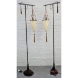 A pair of Italian Cesendello floor lamps with silk conical shades,