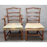 A set of eight George III mahogany pierced ribbon back dining chairs, on canted block supports,