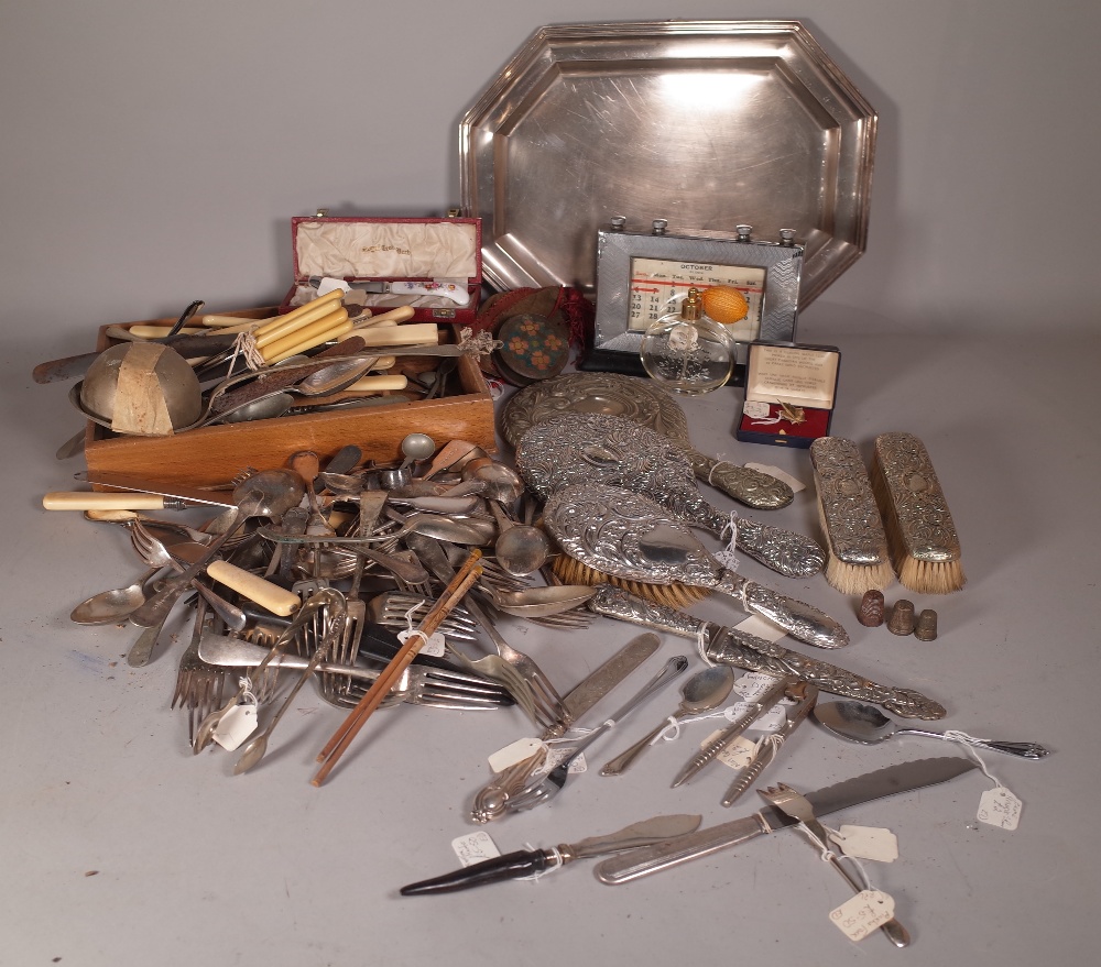 Silver plated wares, including a quantity of mixed silver plated flatware, a dressing table set,