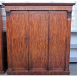 A William IV mahogany triple wardrobe with fitted interior, 200cm wide x 215cm high.