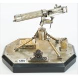 A silver plated brass model of a WW I Vickers machine gun, 20th century,