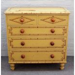 A Victorian faux bamboo polychrome painted chest, of two short and three long graduated drawers,
