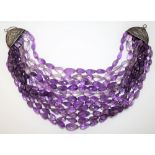 An eleven row amethyst quartz bead necklace,