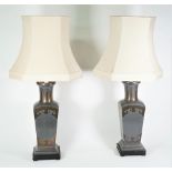 A pair of gilt metal mounted lead grey metal table lamps of Chinese style, 20th century,