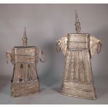 A similar pair of Middle Eastern embossed metal vessels,