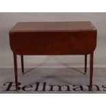 A late George III mahogany Pembroke table with single frieze drawer on tapering square supports,