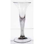 A Continental wine glass, 18th/19th, with bell bowl raised on a teared stem and plain foot, 18.5cm.