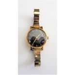 An Omega gilt metal fronted and steel backed lady's wristwatch,