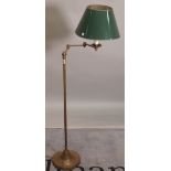 An early 20th century brass angle poise adjustable standard lamp, 127cm high.