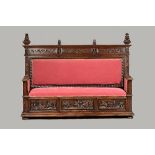 A large 19th century Italian square back walnut settle,