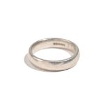 A platinum wedding ring, date engraved within the band, Birmingham 1998, ring size V and a half,