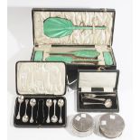 A lady's silver and green enamel mounted composite dressing set, comprising; two hairbrushes,