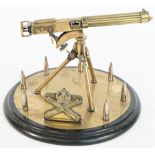 A brass model of a WW I Vickers machine gun, 20th century,