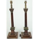 A pair of mahogany and brass table lamps, each of Corinthian column form, 40cm high, (2).