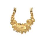A Liberty of London brass and champagne coloured paste collar necklace,