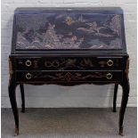 A mid-20th century black lacquer, gilt metal mounted bureau,