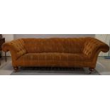 A late Victorian mahogany framed Chesterfield sofa,