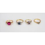 A gold and platinum, ruby and diamond ring, designed as a star, detailed 18 CT & PT,