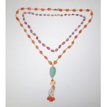 A faceted cornelian bead necklace,
