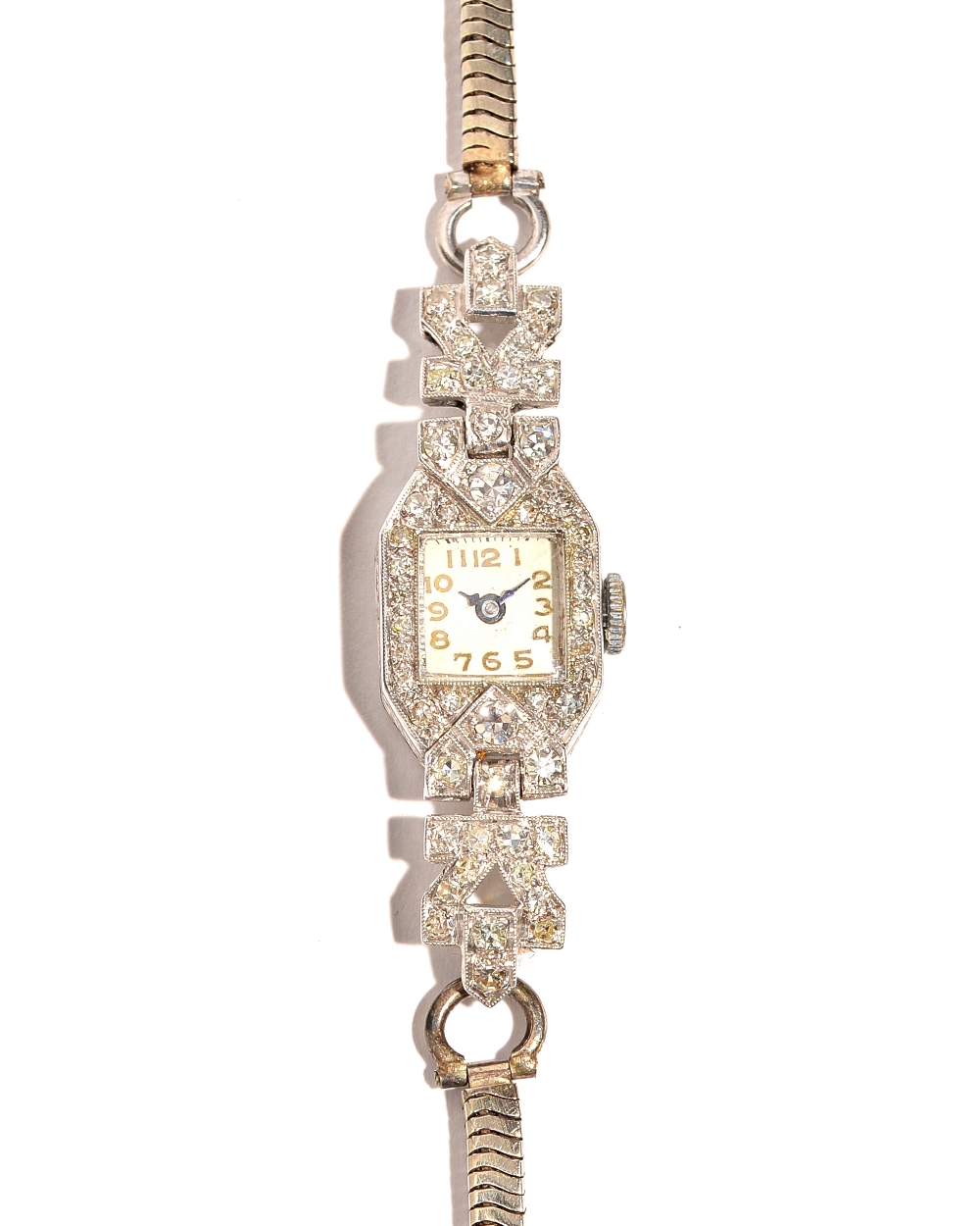 A lady's diamond set cocktail watch, the square white dial applied with gilt metal Arabic numerals,