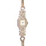 A lady's diamond set cocktail watch, the square white dial applied with gilt metal Arabic numerals,