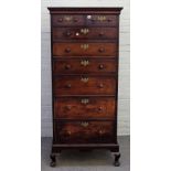 An unusual George III mahogany tall narrow chest,