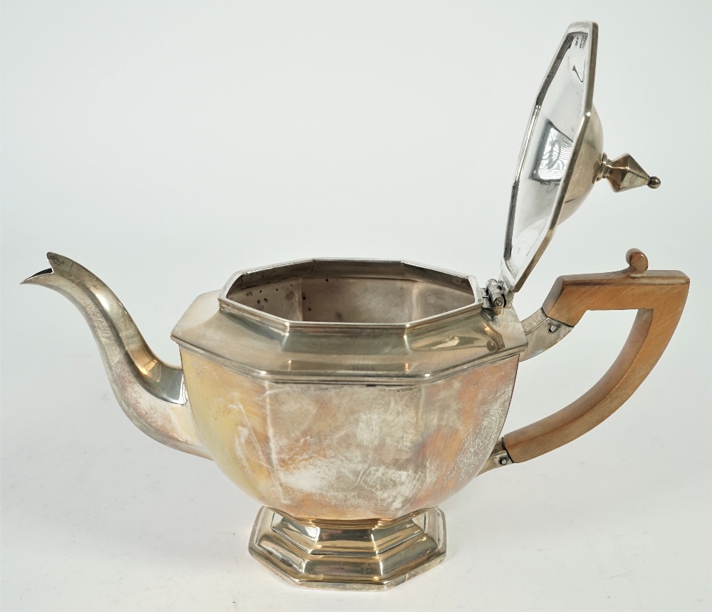 Silver tea wares, comprising; a teapot with a wooden handle, a twin handled sugar bowl, - Image 4 of 4