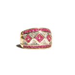 A gold, ruby and diamond set ring, with three ruby set square shaped clusters to the centre,
