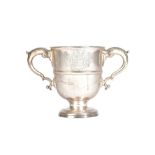 A George II Irish silver twin handled cup, the body decorated with a central band,
