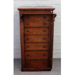 A Victorian rosewood Wellington chest, the seven drawers enclosed by locking bar,