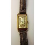 A 9ct gold rectangular cased gentleman's wristwatch,