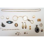 A group of mostly 9ct gold jewellery, comprising; three rings, a pair of drop shaped earrings,