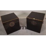 A pair of 20th century black lacquer lift top boxes, 45cm wide x 46cm high, (2).