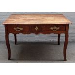 An 18th century French elm centre table, the shaped frieze with three drawers on cabriole supports,