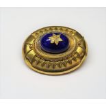 A Victorian gold and blue enamelled oval brooch, circa 1860,