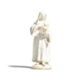 A Bow white glazed figure of an abbess, circa 1755,