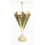 An early 20th century sheet brass stick/umbrella stand, formed as an up-turned umbrella,