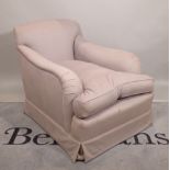 A modern grey upholstered easy armchair, 80cm wide x 92cm high.