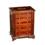 An Edwardian inlaid mahogany table top Wellington chest,