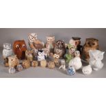 A quantity of assorted models of owls, ceramic, metal and other examples, the largest 16cm high,